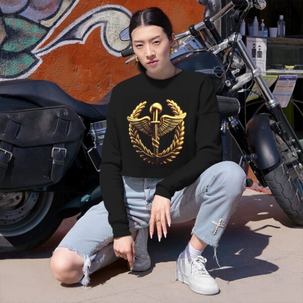 Cropped sweatshirt with a gold emblem