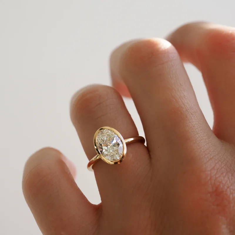 oval bezel engagement ring